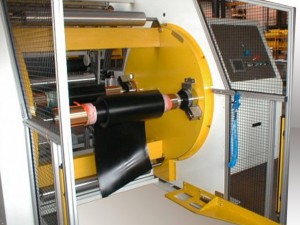 Automatic winder for extruded or calendared rubber - width up to 1600 mm - diameter 1200 mm