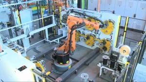 Unloading robot for spooling line